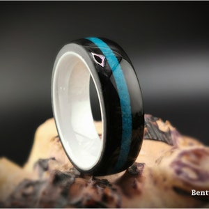 Bentwood Ring: Black Birdseye Maple, inlaid Bisbee Turquoise, Polished White Ceramic Core, wood ring