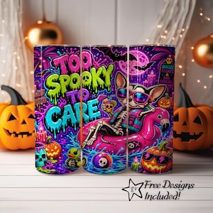 May include: A Halloween-themed tumbler featuring a skeleton chihuahua relaxing on a pink flamingo float. The tumbler has the text "Too Spooky To Care" and includes pumpkins, bats, and a skull. The design is vibrant with neon colors.