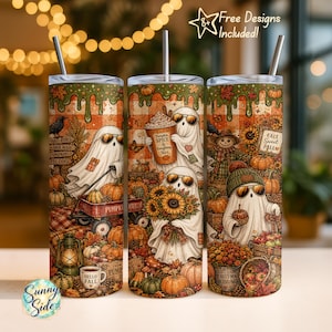May include: Three cylindrical tumblers with metal straws featuring a fall-themed pattern of ghosts wearing sunglasses, pumpkins, sunflowers, and autumn foliage. The design includes text reading Pumpkin Spice & Nice, Fall Sweet Fall, and Autumn Blessings.
