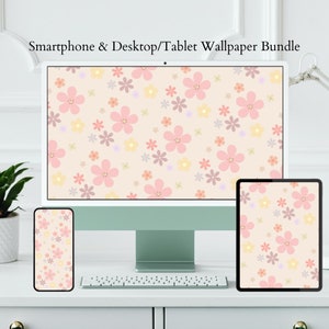 Puede incluir: Un paquete de tres fondos de pantalla digitales con un patrón floral rosa, amarillo y morado sobre un fondo melocotón claro. Los fondos de pantalla se muestran en una computadora de escritorio, una tableta y un teléfono inteligente.