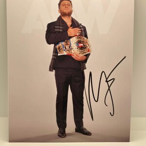 May include: A set of three ceramic mugs with a speckled, matte finish. The mugs are in shades of cream, light gray, and dark gray. Each mug has a simple, minimalist design, perfect for coffee or tea.