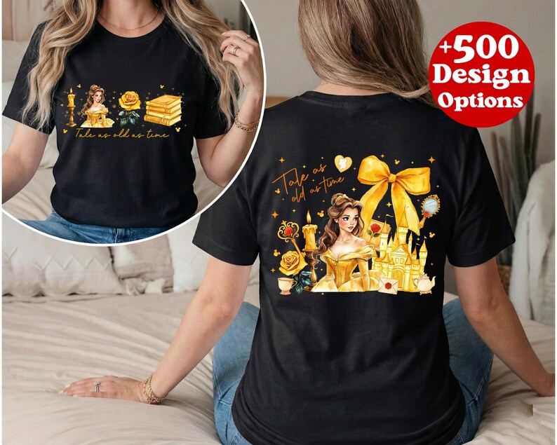 Puede incluir: Camiseta negra con un dise&ntilde;o de "La Bella y la Bestia". El frente muestra una princesa, una rosa, libros y el texto "Tale as old as time". La parte trasera presenta un castillo, un lazo y el mismo texto.