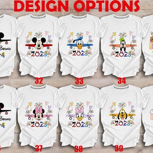 May include: Ten different designs for t-shirts featuring Disney characters, including Mickey Mouse, Minnie Mouse, Donald Duck, Goofy, and Pluto. The shirts are white and feature a variety of designs, including fireworks, aeroplanes, and the words "Disney Bound" and "2023".