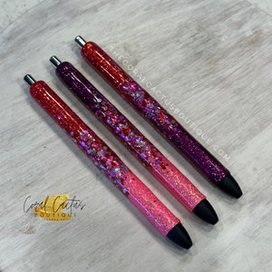 Rode, paarse en roze dikke harten glitterpen
