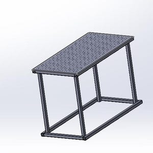 May include: A metal table with a grid pattern on the top. The table is angled and has a rectangular frame.