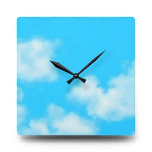 May include: A square clock with black hands against a blue sky background with white clouds.