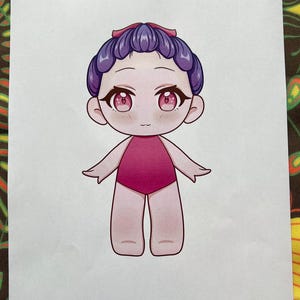 May include: A paper doll illustration of a cartoon character with purple hair and a pink swimsuit. The character has large, pink eyes and a small smile. The text "Paper Dolls By Mila" is at the bottom.