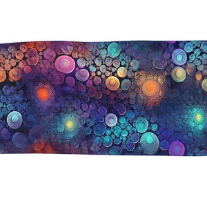 May include: A rectangular rug with an abstract design. It features a dense pattern of overlapping circles in shades of blue, purple, orange, and teal. The rug has fringed edges, and the measurements are in centimetres.