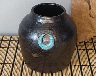 Ceramic moon vase.