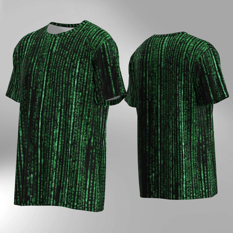 May include: A black t-shirt with a green digital rain pattern, shown from the front and back. The design features vertical lines of green characters resembling code. The shirt has short sleeves and a crew neck.