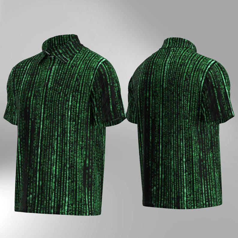 May include: A short-sleeved collared shirt featuring a vertical green and black digital rain design. The shirt has a button-up collar and a classic fit. The pattern covers the entire shirt, front and back, creating a distinctive visual effect.