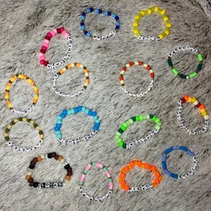 Coldplay Bracelet Set: Handmade Beaded Bracelets with Song Titles