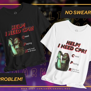 May include: Two black and white t-shirts with a red graphic print of a person singing with the text "HELP! I NEED CPR!" and "Creed Playing Really Loud At All Times" underneath. The text "NO SWEARING?" is in a yellow box above the white t-shirt and the text "NO PROBLEM!" is in a yellow box below the black t-shirt.