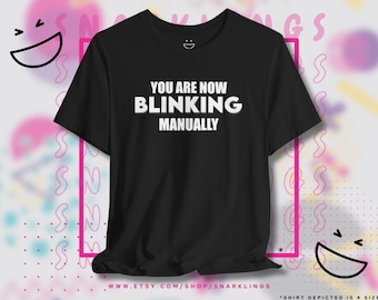 You Are Now Blinking Manually Graphic Tee