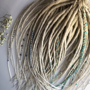 Blonde synthetic dreadlocks and silver dreads with braids and accessories fake hair extensions