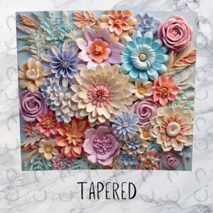 May include: A close-up of a 3D floral arrangement featuring a variety of pastel-coloured flowers, including pink, blue, yellow, and white. The flowers are arranged in a cluster and have a textured, layered appearance. The word "TAPERED" is written in black letters at the bottom of the image.