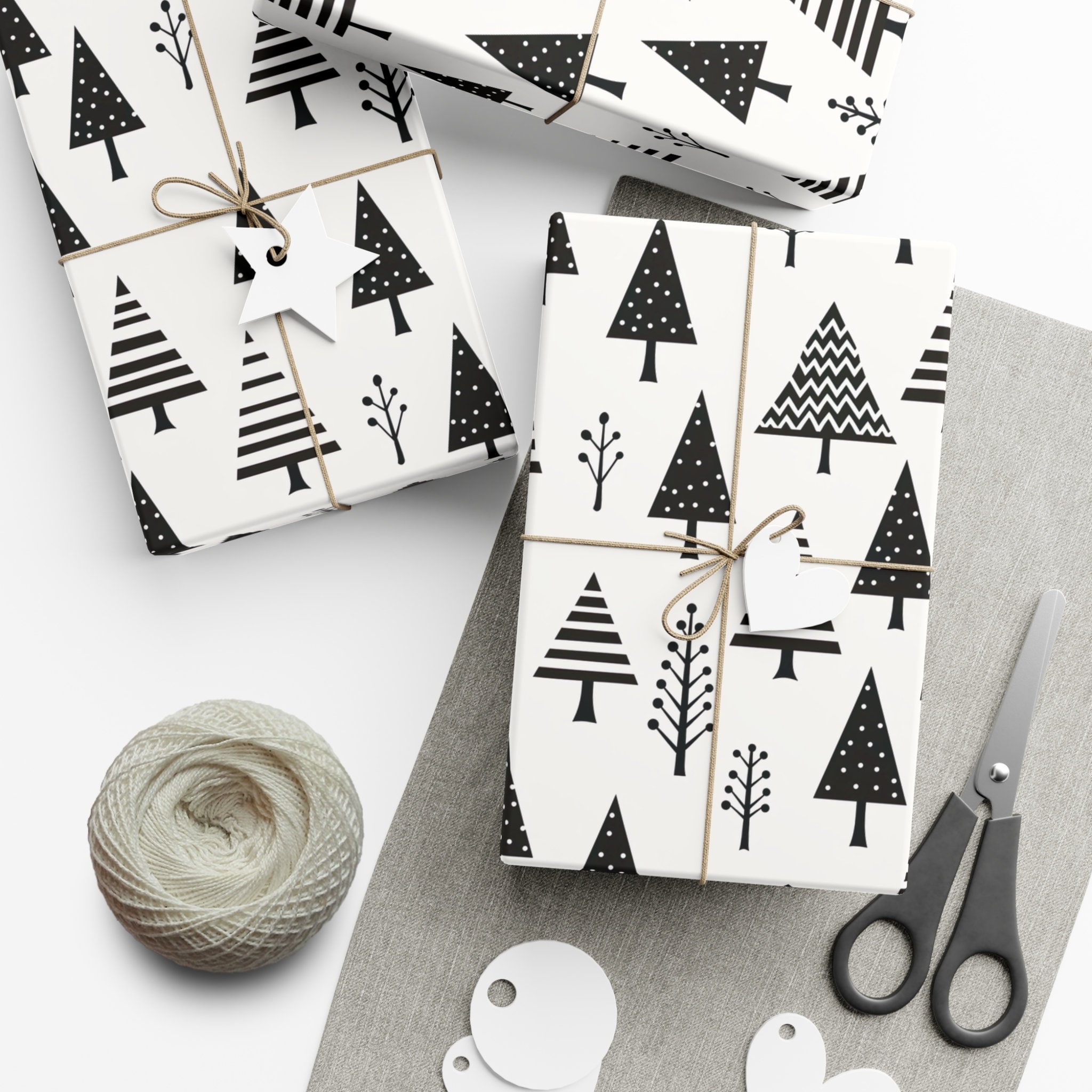 Christmas Gifts White Wrapping Paper Ornatent Spruce Sprig Black Tags Stock  Photo by ©The_Atlas 535448726