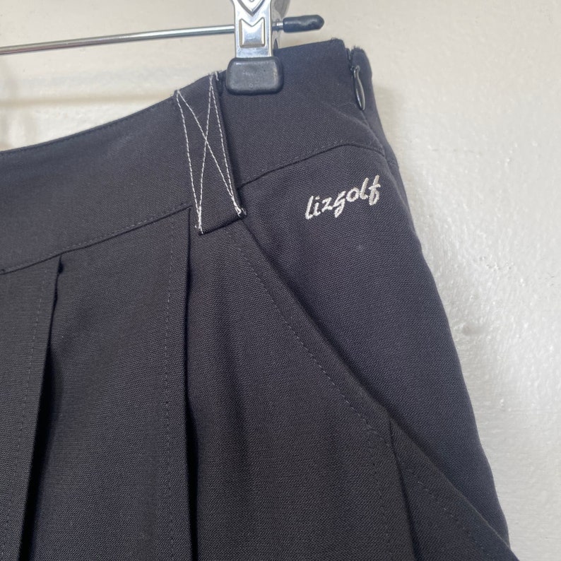 Mini jupe plissée noire Liz Claiborne Golf avec poches printemps-été image 2