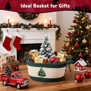 May include: A Christmas-themed display featuring a woven basket filled with gifts, pinecones, and a small Christmas tree. A red toy truck and ornaments are in the foreground. The text "Ideal Basket for Gifts" is at the top.