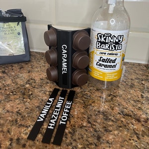 Lavazza coffee pod capsules and flavouring syrup holder dispenser tidy, and flavour tags