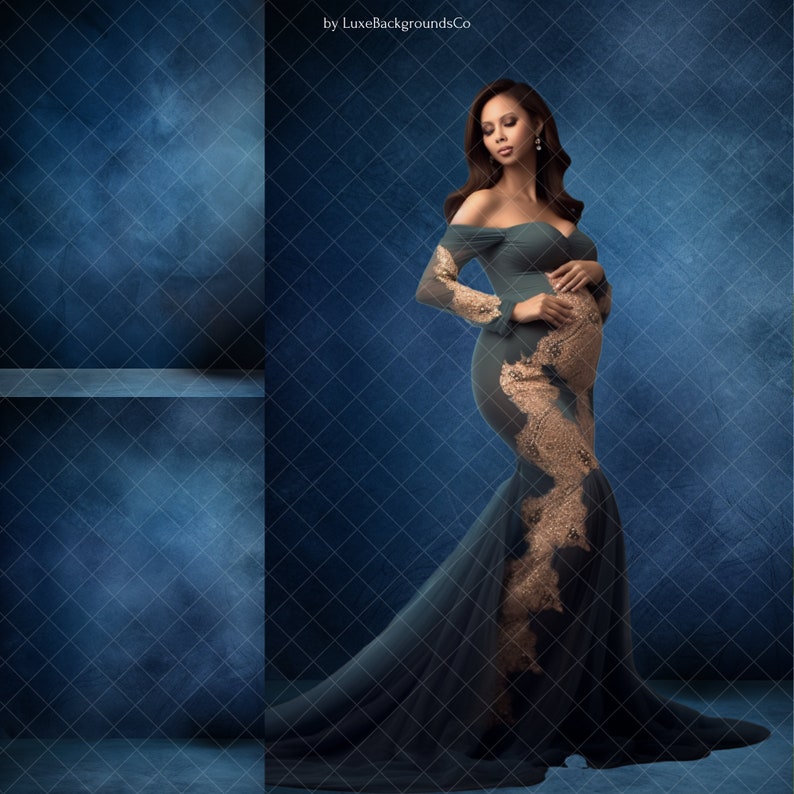 May include: A pregnant woman in a teal mermaid-style gown with gold lace accents poses against a blue textured backdrop. The gown has an off-the-shoulder neckline and long sleeves.