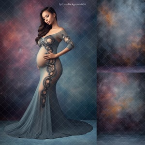May include: A pregnant woman in a long, flowing, light blue gown with lace detailing stands against a blue and purple textured background. The gown has a sheer bodice and a fitted skirt.