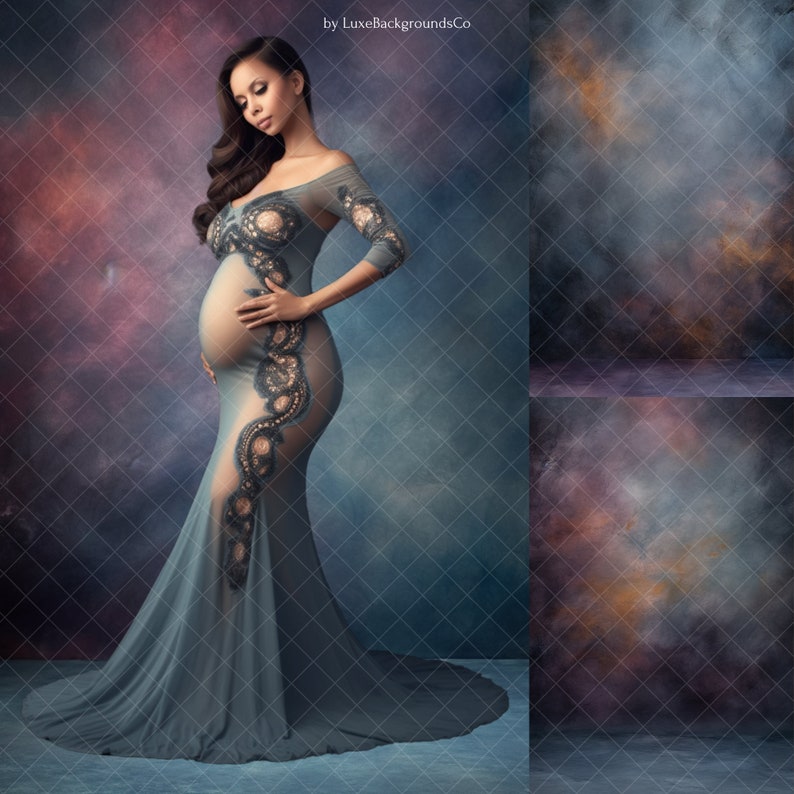 May include: A pregnant woman in a long, flowing, light blue gown with lace detailing stands against a blue and purple textured background. The gown has a sheer bodice and a fitted skirt.