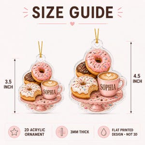 May include: Two 2D acrylic ornaments featuring donuts and a coffee cup labeled Sophia on a pink cake stand. The smaller ornament is 3.5 inches tall, and the larger is 4.5 inches tall. Both are 3mm thick with a flat printed design.
