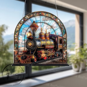 May include: A decorative stained glass window panel depicting a vintage steam train. The train, with red, black, and gold detailing, is set against a blue sky with clouds. The arched frame enhances the decorative nature of the piece.