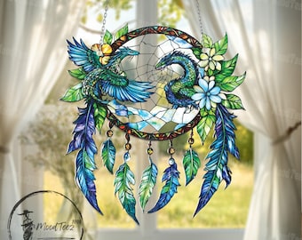 May include: A decorative dreamcatcher featuring two stylized dragons in shades of blue and green. The dreamcatcher has a circular frame with a web design, adorned with feathers and floral accents. The design is suspended by a chain.