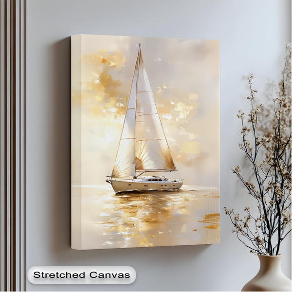 Quadro em tela com veleiro dourado: moldura flutuante prateada, decoração de parede com tema costeiro.