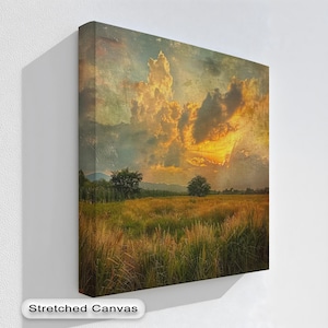 Canvasprint Sunset Meadow: landschap van het gouden uur met natuurlijke houten lijst
