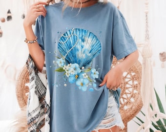 Blue Seashell PNG with Flowers & Pearls – Coastal Summer Sublimation Design for T-Shirts, Ocean Beach Graphic Clipart