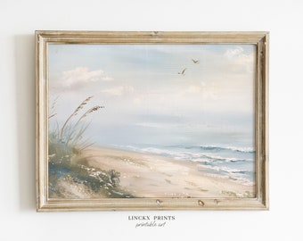 May include: A framed vintage beach scene painting. The artwork depicts a sandy beach, ocean waves, and a light blue sky with clouds. The painting is in a distressed, light-colored wooden frame. The text "LINCKX PRINTS printable art" is at the bottom.