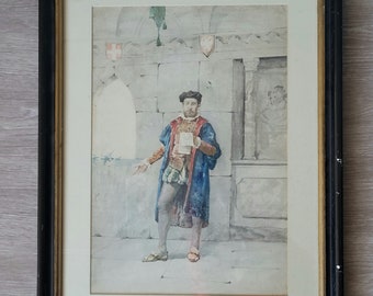 May include: Framed watercolor painting of a man in historical attire, holding a paper and gesturing. The man wears a blue robe, a hat, and sandals. The background features stone walls and architectural details. The painting is in a black frame.