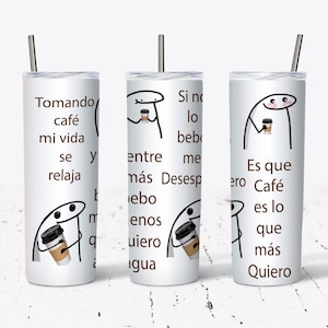 May include: Three stainless steel tumblers with a white background and black text. The tumblers feature a cartoon character holding a cup of coffee. The text on the tumblers reads "Tomando cafe mi vida se y relaja", "Si no lo beb me entre mas Desesp ueb enos uiero igua", and "Es que Cafe es lo que mas Quiero".