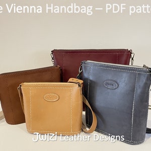 May include: Four leather handbags in different colors and sizes. The handbags have a zipper closure and a strap. The handbags are arranged in a row on a table. The text "Jwlzi Leather Designs" is visible at the bottom of the image.