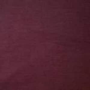 May include: Burgundy fabric with a subtle woven texture. The colour is a deep, rich shade of red-purple, with a slightly matte finish. The fabric appears to be a medium weight, suitable for various sewing projects.