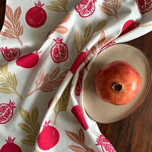 Linen tea towel, napkin, or table runner with pomegranate. Linocut prints on white linen. Handmade, my own design.