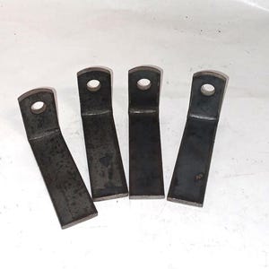 L bracket Flat steel Weld on 90* degree tabs. Secures railing to walls posts columns and more 3 1/2 " x 1"x 3/16 thick