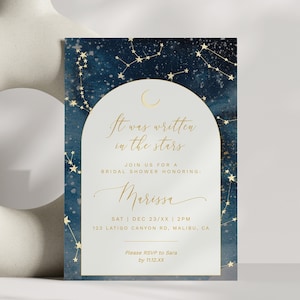 May include: A blue and gold bridal shower invitation with a constellation design. The text reads "It was written in the stars" and includes the bride's name, date, time, and location.