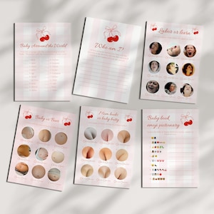 May include: A collection of pink and white baby shower game cards. The cards feature cherry illustrations and titles like "Baby Around the World," "Who am I?" and "Labor or Lovin." The cards have a pink gingham pattern.