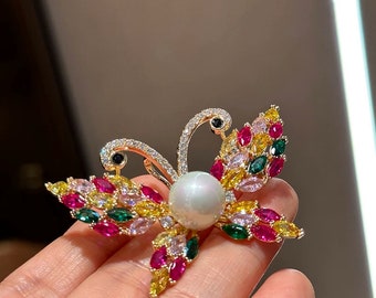 Broche de concha de mariposa