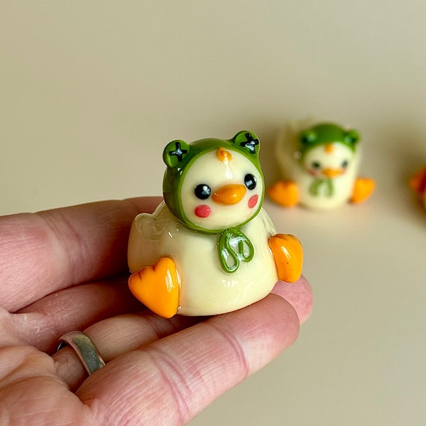 Chubby duck in frog hat polymer clay bird figurine, mini cottagecore kawaii desk decor