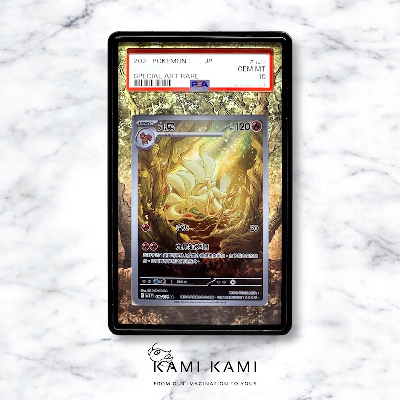 Puede incluir: Una carta de intercambio japonesa de Pokemon que presenta un zorro dorado de nueve colas, conocido como "Ninetails", con el texto "Ninetails" y "120" en japon&eacute;s. La carta est&aacute; calificada como GEM MT 10 y es una carta Special Art Rare.