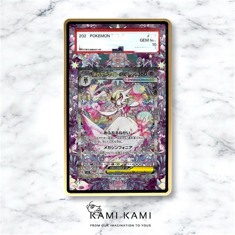 May include: A framed Pok&eacute;mon card featuring a Gardevoir EX illustration with Japanese text. The card is graded GEM MINT 10 and encased in a gold-colored frame. The card's artwork includes pink, white, and purple hues.