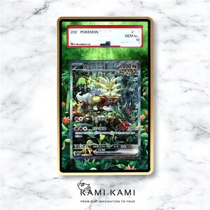 May include: A Pokémon trading card encased in a gold-framed holder. The card features a colorful illustration of a creature in a jungle setting. The holder has a red and white label with the number "202" and "GEM M 10". The card is from the "Kami Kami" collection.