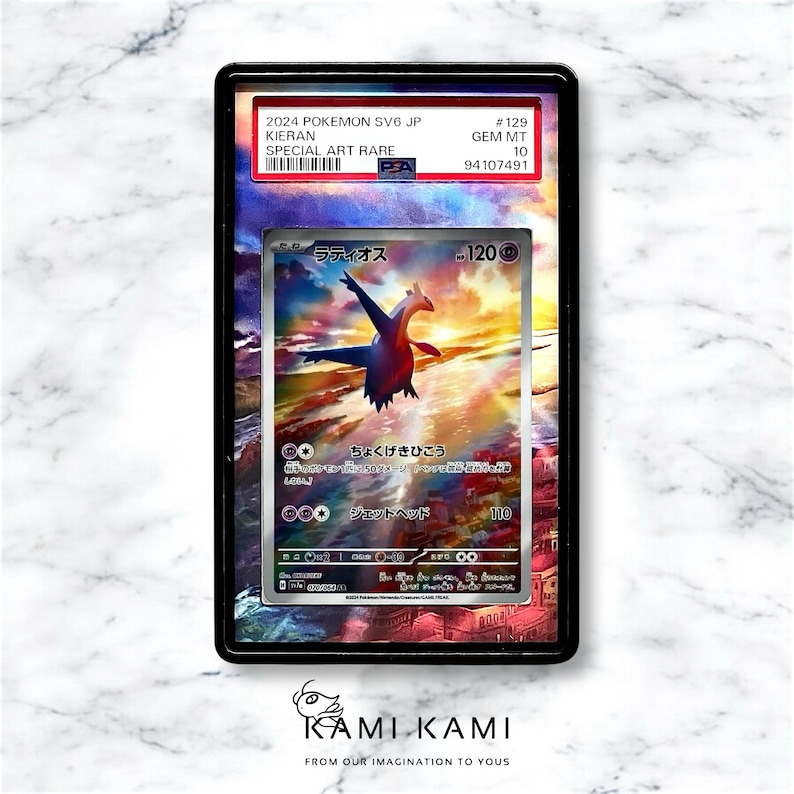 May include: A graded Pok&eacute;mon trading card featuring Latios, a blue and red dragon-like creature, with Japanese text. The card is encased in a black holder with the text "2024 POKEMON SV6 JP KIERAN SPECIAL ART RARE".