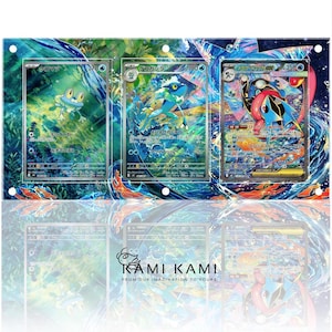three Pokémon cards with vibrant, colorful designs and unique Pokémon characters.