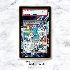 May include: A framed Pok&eacute;mon trading card featuring a blue and white aquatic creature illustration. The card is encased in a gold-colored frame with text that includes "202 Pok&eacute;mon" and "GEM MT 10". The card has Japanese text.